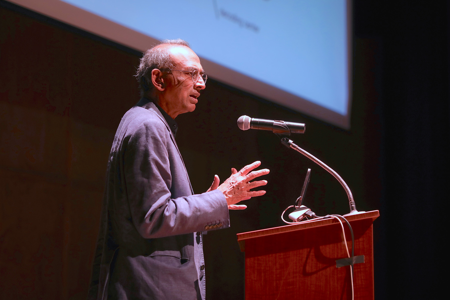 Venkatraman “Venki” Ramakrishnan speaks during the public lecture “My Adventures in the Ribosome” Monday, Jan. 22, 2024 at Opperman Music Hall, followed by a signing of his book “Gene Machine: The Race to Decipher the Secrets of the Ribosome.” (Devin Bittner)